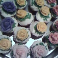 Cupcakes! i made these for a bake sale my neighborhood was having. they went over well!! I used white cake sparkles to make them look sparkly. made...