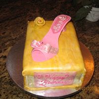 Shoe/shoebox Cake I made for a birthday. Shoe is all sugarpaste, cake is chocolate with chocolate caramel filling, buttercream icing and fondant covered...