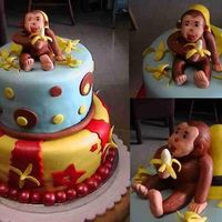 Curious George Fun cake! All mmf and w/ some gumpaste for the monkey and bananas.
