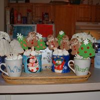Cookie Boquets (First Attempt) These were dipped in thinned royal and I couldn't get the red - red eneough. I used candy melts instead when I figured out the royal...