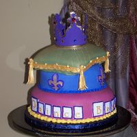 100_5318.jpg This was my first attempt at a "Pillow" cake. Thanks pyxxydust for your help! I tried making the crown out of fondant (didn'...
