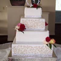Fondant Wedding With Scroll Work And Draping cake covered in fondant, scroll work in buttercream, draping done with new mold from first impressions, this mold was a huge time saver