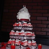 40Th Anniversary Cake cake with cupcake tree for my parent's surprise 40th anniversary party. The cake topper is the original from their wedding cake. Not...
