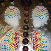 Isabella;s Butterfly Cake This is a 36" x 36" board so you have a size reference. Each wing was cut from a different kind of cake, the head is cut into a...