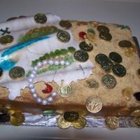 Treasure Map Birthday Cake This cake was made for an 8 year old boy. Yellow cake, torted, with peach jam and dulce de leche filling. Map and pearls were made of...