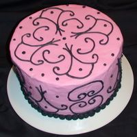 Cake6.jpg This was my first try at scroll work. HELP ME!! I love the way it looks on cakes, but I guess I just need a steady hand and more practice...