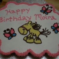 Giddy Up This was for my niece's 9th birthday. It was a horse themed party. It was my first cupcake cake. The horse and butterflies are...