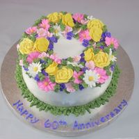 Gram And Gramps Celebrating 60 Years Together This is a french vanilla doctored cake mix with Wilton Class Buttercream icinf and royal icing flowers. Wilton Buttercream is not my first...