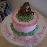 Moira's Meadow This is a 6 inch, 3 layer cake. The horses are chocolate transfers. It was a prototype cake.