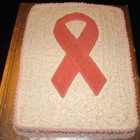 Pink Ribbon Cake Sheet cake (1/2 white, 1/2 chocolate) with buttercream icing. Made for an event in support of breast cancer research.