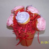 Cupcake Bouquet I did this bouquet to sell in a local candy store for valentines... This was my first one!!! Still trying to perfect them!!!