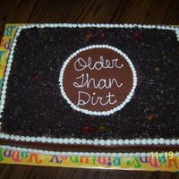 60Th Birthday Cake Chocolate cake with crushed oreos as the dirt and gummy worms....