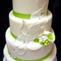 Green & White Green and white wedding cake with gum paste flowers