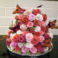 Rose Tower This is my take on Peggy Porschen's rose tower. I did not carve it into a cone, it is simply a 6" stacked on an 8".