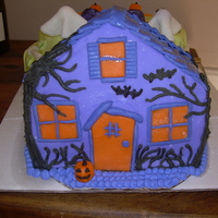 Haunted House Cake I froze the chocolate cake and iced with buttercream icing, covered in fondant and icing decoration.