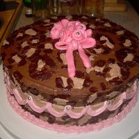 Leopard Cake With Rosebuds My first try at leopard print. It's not as easy as it looks. Rosebuds on top are fondant.