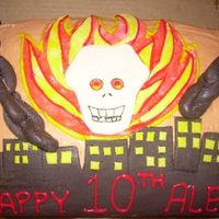 Ghost Rider Cake For my son's birthday, he chose one layer of red velvet cake and one layer of devil's food cake and he actually sketched out the...