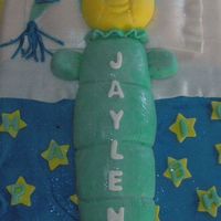 Glow Worm This cake was done for my nephew's first birthday. It was a half sheet for the bed and a glow worm made out of fondant.
