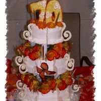 Mom's 70Th Birthday Cake This was a 3-tier birthday cake with fresh flowers. Iced in buttercream.