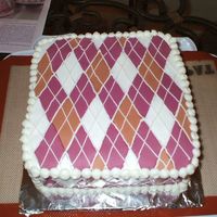 Argyle Birthday Cake I made this for a girl at work. My first time working with fondant (as I'm sure you can tell). Also my first square cake. I learned a...