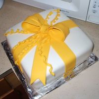 Course 3 Bow Cake We didn't have time in class to put the flowers on or the border actually. I used MMF for the cake covering and wilton fondant for the...