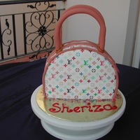 Lv Purse Edible Image logo and fondant accents.