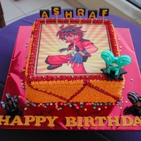 Bakugan Edible image, fondant letters and plastic bakugan toys.