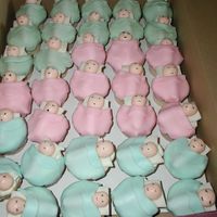 Lots And Lots Of Babies Cupcakes made to look liks little babies all bundles up