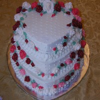 Happy Wedding Day Three tier w/ carrot cake on the top. Tripple chocolate in the middle and chocolate marble on the bottom. Buttercream frosting and royal...