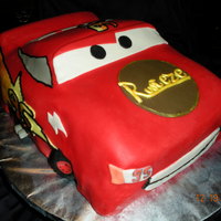 Lighning Mcqueen This was a carved cake put of chocolate and buttercream, Then covered in fondant.