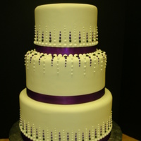 Purple Cake Round, Covered in Fondant with purple design