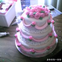 Friends Wedding Cake i made this cake for my friends wedding. this is my first ever wedding cake im suprised it came out the way it did...