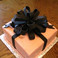 Pink And Black Cake 2 layer white cake with pink buttercream and black fondant bow. This was for one of my best friend's daughter's 18th birthday...