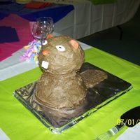 Grooms Cake- Beaver This is a grooms cake I made for an anniversary celebration. It and the 3-tiered white wildflower cake were my first paid cakes. The beaver...