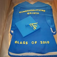 Graduation Gown And Cap A graduation gown cake, vanilla cake covered in white choc buttercream and then covered in fondant