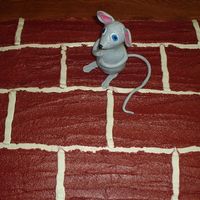 Bricks Everywhere this was a cake i made for my brother in law when he retired from center brick .cake is yellow covered with buttercream , the mouse is...