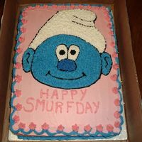 P1110646.jpg Birthday cake for coworker that we call smurf , strawberry cake with bc icing.