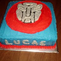 Transformer yellow cake with buttercream icing and silver sugar crystals