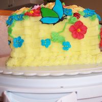 Yellow Flower Basket Buttercream basketweave with RI flowers, ladybugs and butterflies.