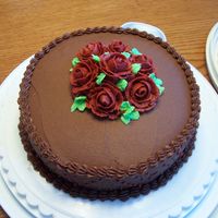 Wilton Course I Finale Cake Chocolate buttercream with red roses