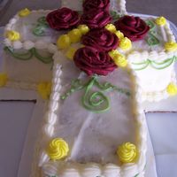 Easter Cross Cake All buttercream. The buttercream was a little on the soft side so it was a little rough.