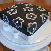 Black & White Brushed Embroidery Black fondant with RI brushed embroidery and white fondant ribbon