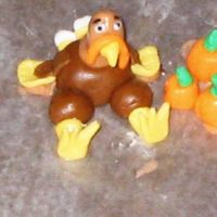 Fondant Turkey Thank you TexasSugar for sending me in the right direction on how to build these cute little guys. It was sooo much fun. Unfortunately, I...