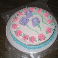 Buttercream Flowers 2nd cake ever decorated. Cake and all of the decorations and flowers are made out of buttercream. Had a problem with the icing because my...