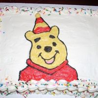 Winnie The Pooh Winnie the pooh. White cake with buttercream and sprinkles
