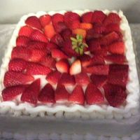 Strawberry Cake White chocolate cake with buttercream icing and fresh strawberries