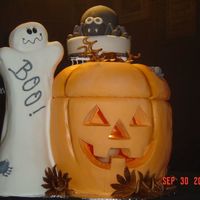 Halloween This sets on a 36"X36" board, to give you an idea of it's size. We built the cake board so that we had a dowel coming up the...