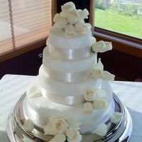 Elegant this cake was made for a lady that wanted something that was simple and elegant! She was very happy with the out come. this cake was an old...