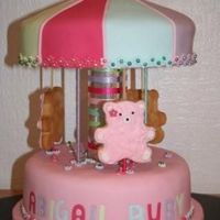 Carousel Cake Made for my nieces Dedication/Thanksgiving. Adapted from Australian Womens Weekly. Butter biscuit bears decorated in royal icing, Fruit...