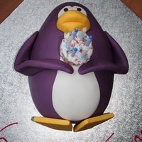 Club Penguin Birthday Cake 6th birthday cake for a Club Penguin fan. The cake he's holding was a stack of cookies with candles stuck into a top layer of sugar...